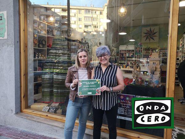 A punto cangrejo, Moän Moda y Pan Menesa, ganadores del concurso de escaparates de Navidad de Castro